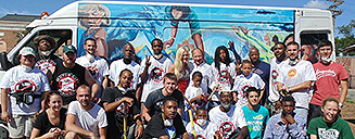Photo of 2014 Urban Pioneers, and other volunteers, during a weekend volunteer event.