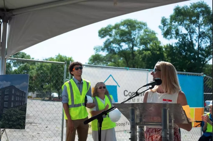 Deidre Schmidt (right), president and CEO of CommonBond Communities, celebrates the groundbreaking of Rise on 7 with staff and crew in St. Louis Park.