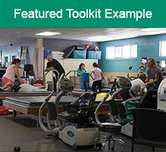 Image of a gym with the text "Featured Toolkit Example" above it.