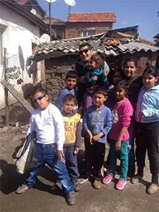 Photo of Roma Children Enjoy Badges "I am Protected"
