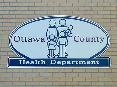 Photo of Ottawa County Health Department building sign.