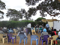 Photo of attendees gathered for the Community Dialogue Day in Komo, Kenya.