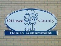 Photo of Ottawa County Health Department building sign.