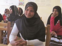 Image of girl in a classroom.