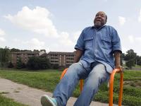 Photo of Broderick Crawford in a park.